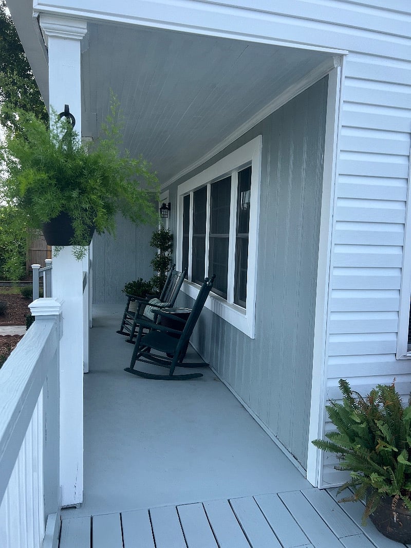 Covered porch with two rocking chairs
