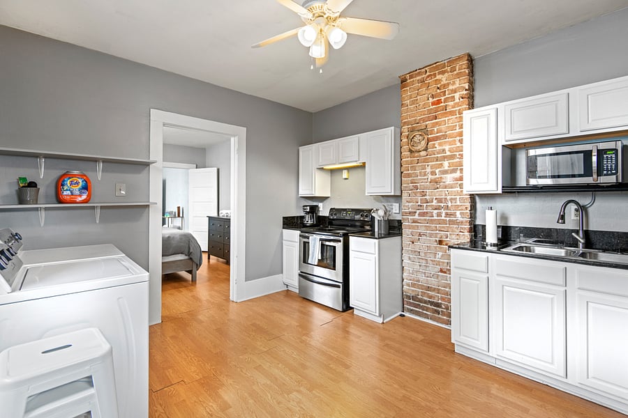 Tenant is supplied with starting cleaning supplies, soaps, and toiletries. Cleaning supplies are stored under the kitchen sink.