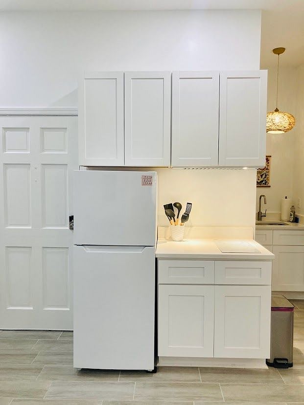 Make yourself at home, cooking on induction stove, storing food and drink in the 10 cu refrigerator, cabinets and closet. Selection of coffee and teas provided for your enjoyment.