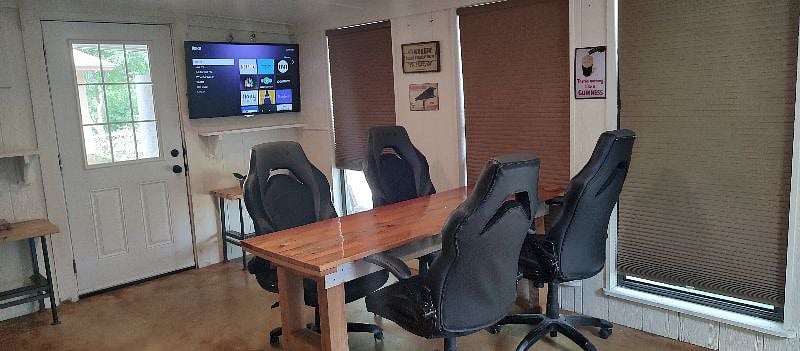 Family Room with comfy gaming chairs for game night or streaming.
