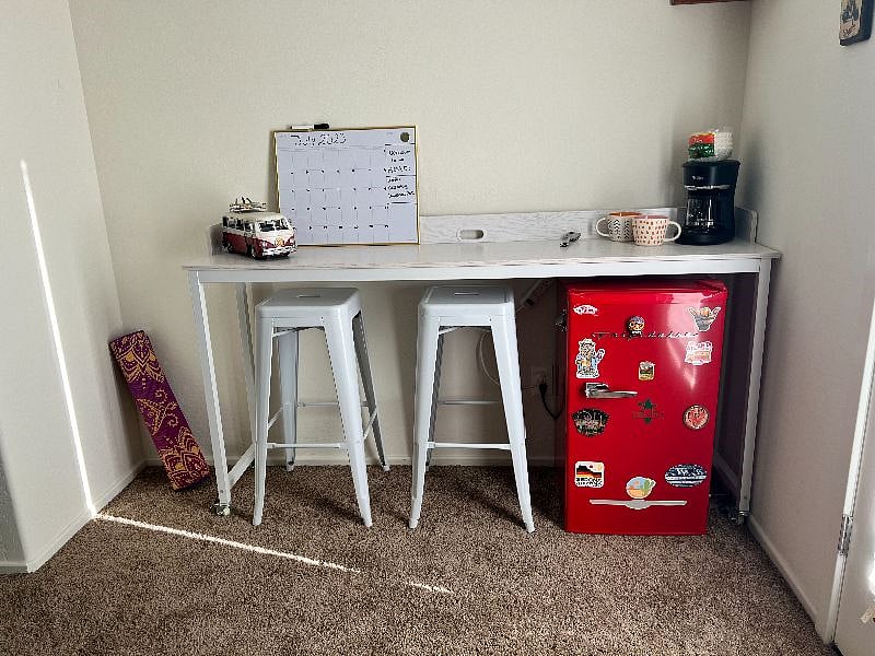 Coffee bar and mini fridge located in your private den