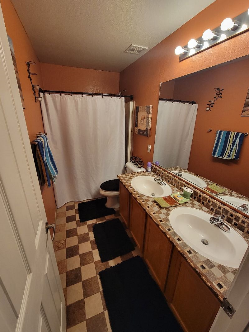 shared bathroom for both rental rooms