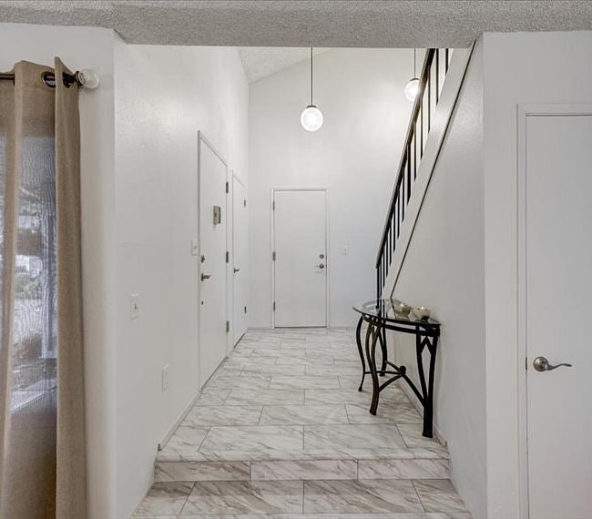 Foyer to front door and to garage