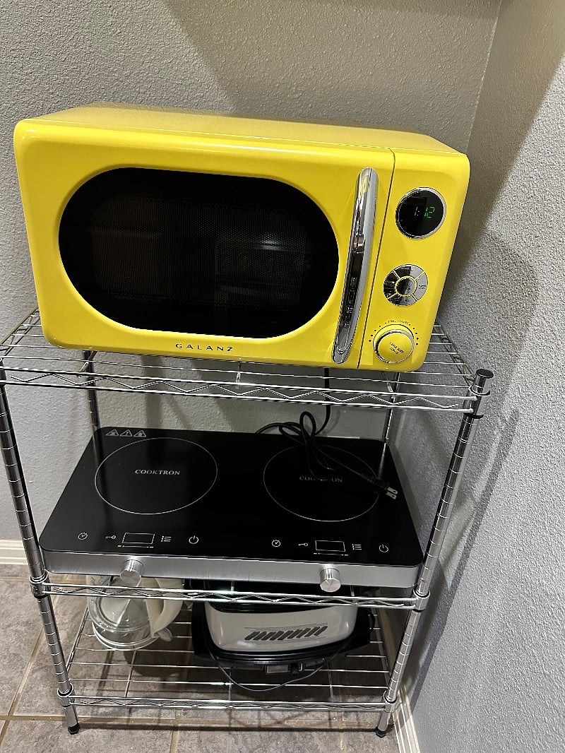 Retro look microwave. Storage space for appliances.