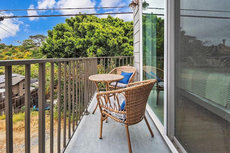 There is a deck off the bedroom