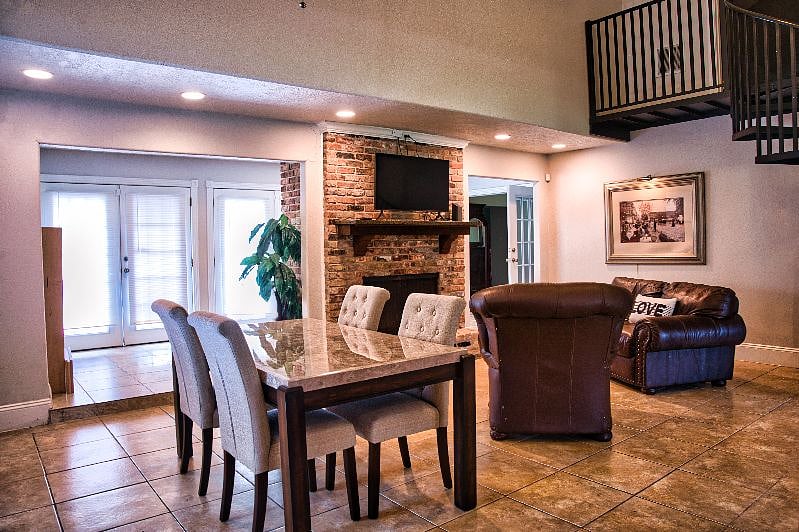 Dining for 6 or relax by a fireplace.