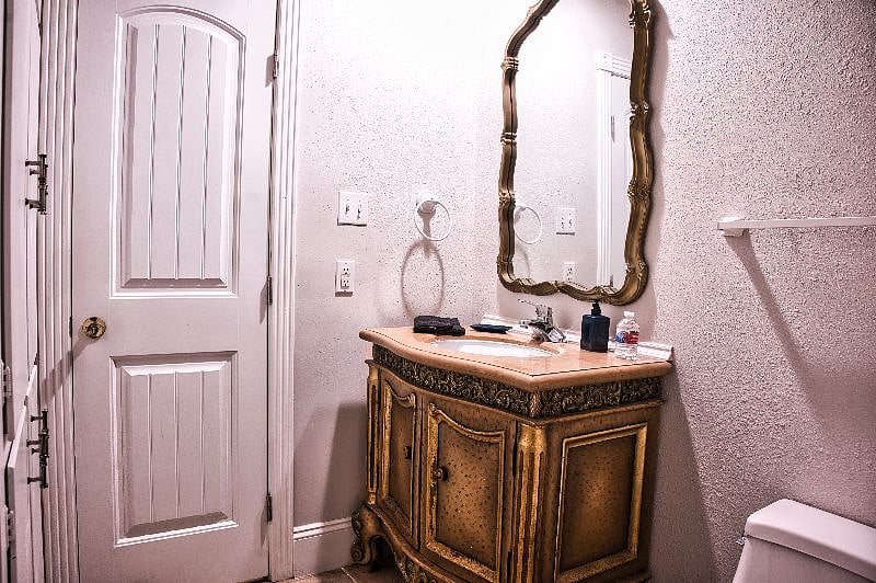 This is the first of 2 private 1/2 baths that share the tub/shower combo.