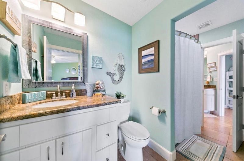 jack and jill style bathroom with tub/shower combo