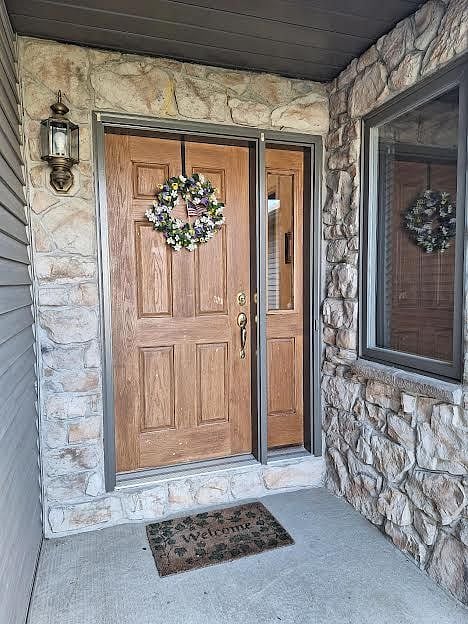 Front door, room to right