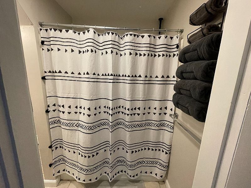 Shower curtain for shower/bath tub