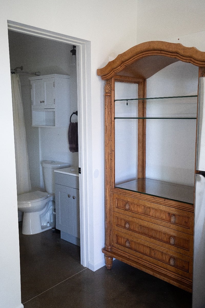 Private bathroom with beautiful rattan storage 