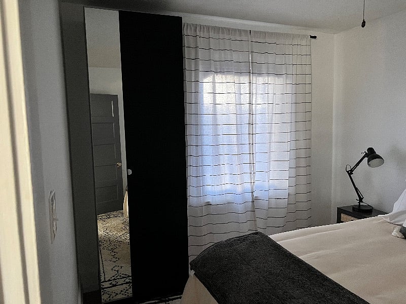 Ikea wardrobe in second bedroom for great storage.