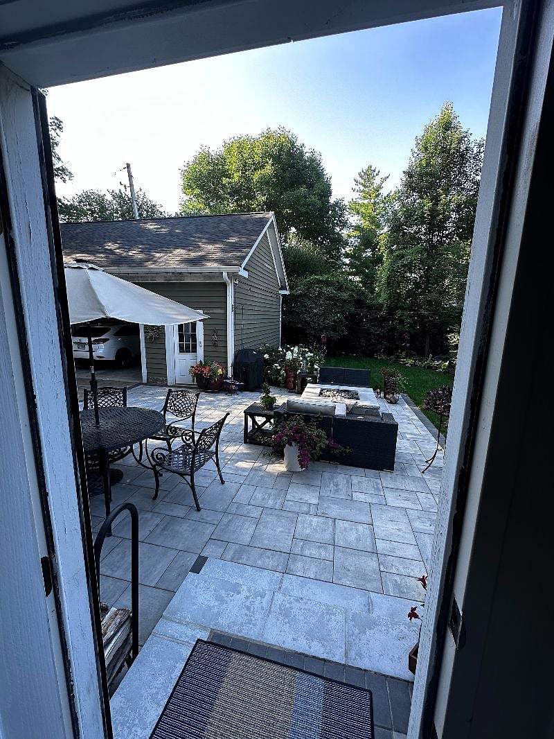 Back yard patio with firepit and grill