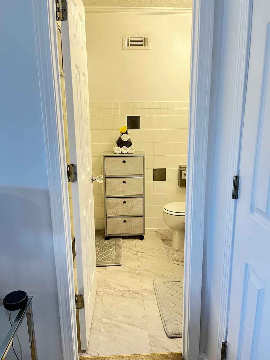 Full bathroom with drawers for extra storage 