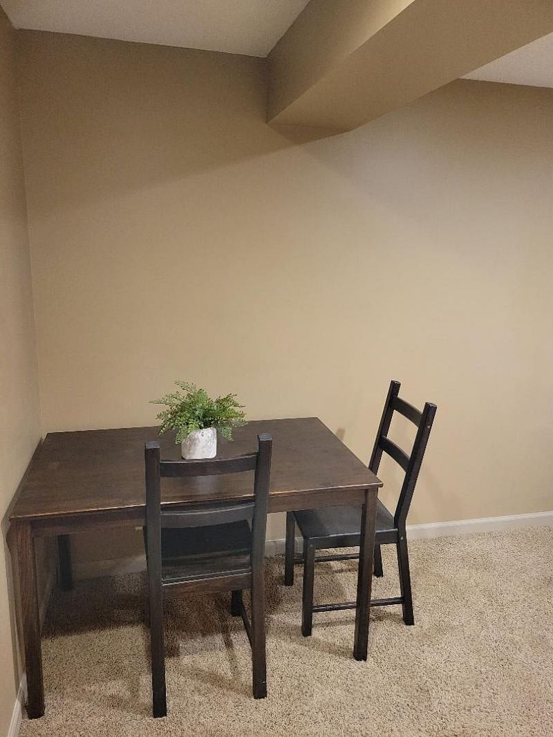 Dining area within corner of living room