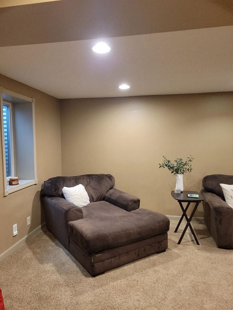 Living room left side and egress window