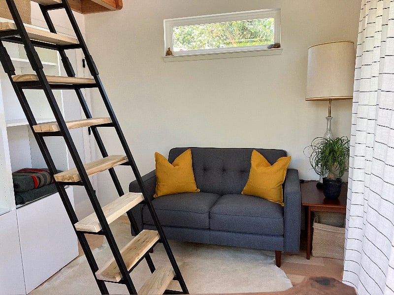 Living area; loft staircase folds up straight for more space