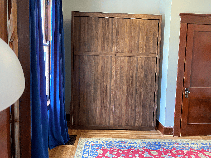 Bedroom 2 with Murphy bed up. Room for a pack-n-play (not provided) or yoga (yoga mat provided.)