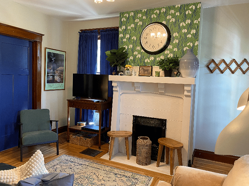 Living room with decorative fireplace.