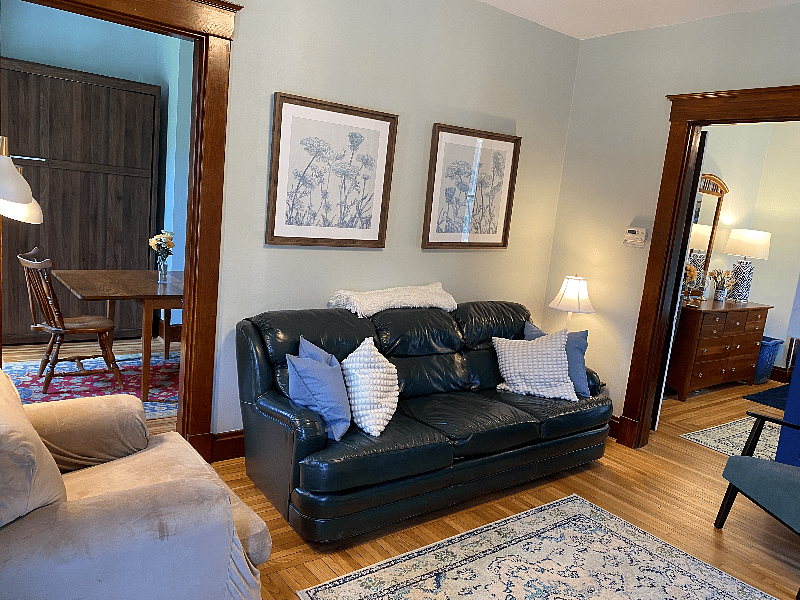 Livingroom. Doors to primary bedroom open.