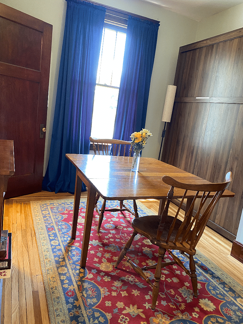 Bedroom 2: Can be used as an office or a dining room when not being used as a bedroom. This picture shows table fully extended and Murphy bed up.