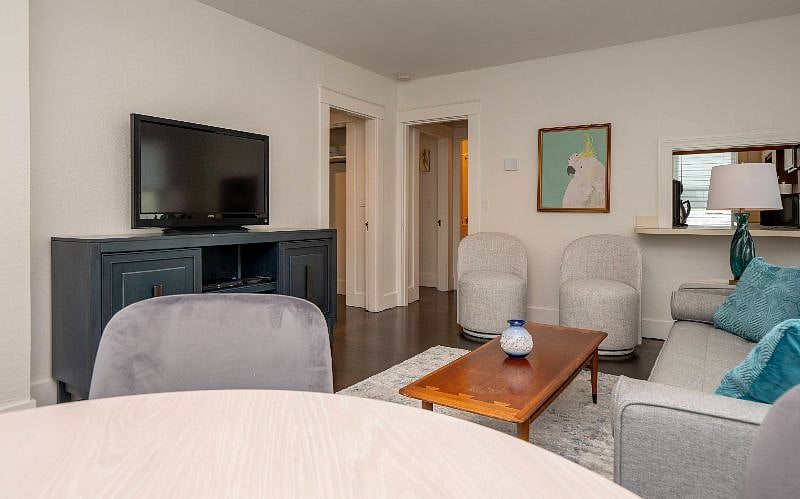Open Livingroom/Dining area with seating for 4 people