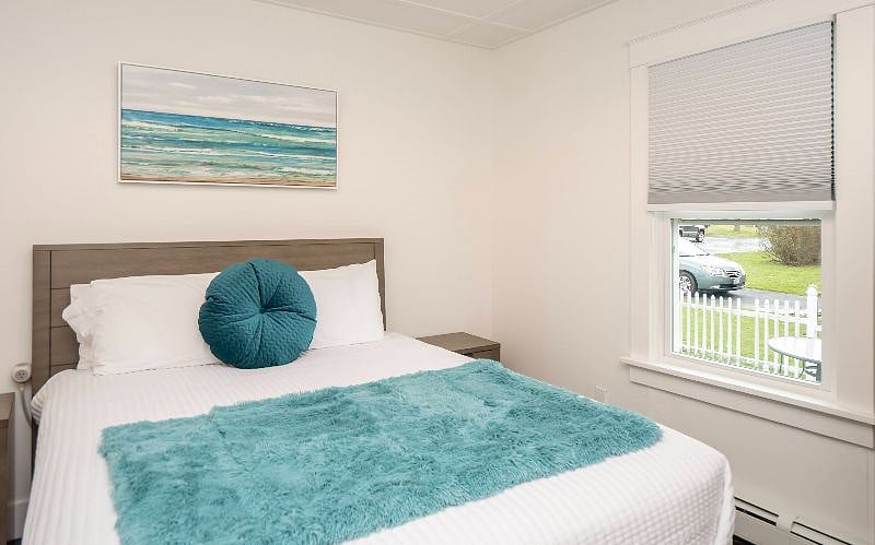 Queen bedroom with dresser, night stands and drawers under the bed. New mattresses