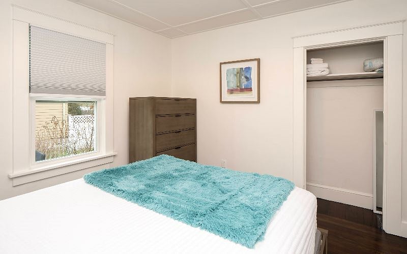 View of the closet in first queen bedroom