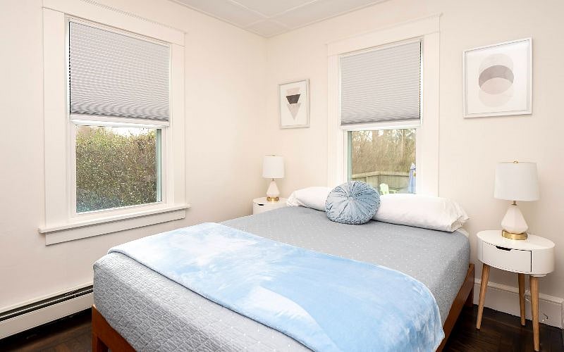 Another view of the second bedroom with a queen sized bed