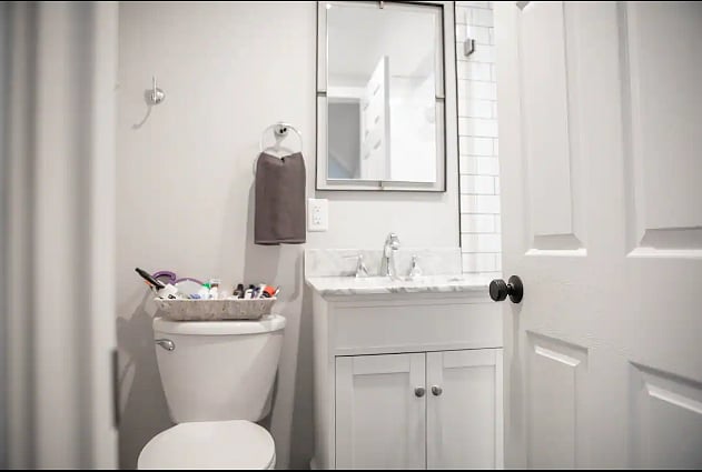 Our full bathroom has a basket of often forgotten items that you can use when you need, Public Goods hand soap, shampoo, conditioner, and body wash!