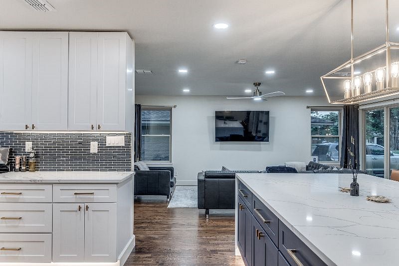 Kitchen and Island overlooking Living Room.