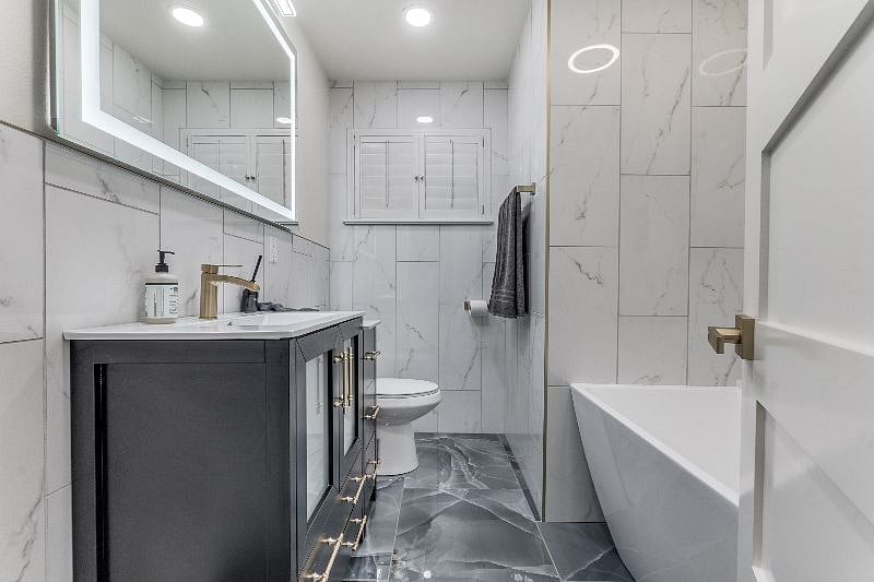Freshly remodeled Hallway Bath, Built in Bluetooth Speaker, LED Mirror