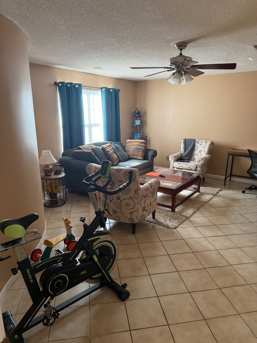 Downstairs family room with stationary bike