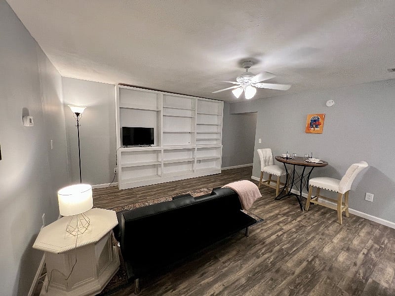 There is now a more cozy tan couch, but don't want to disturb the renter who is packing up to take a photo yet.