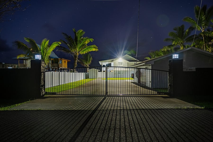 Electric gate front entry from Paradise Ala Kai Drive at night
