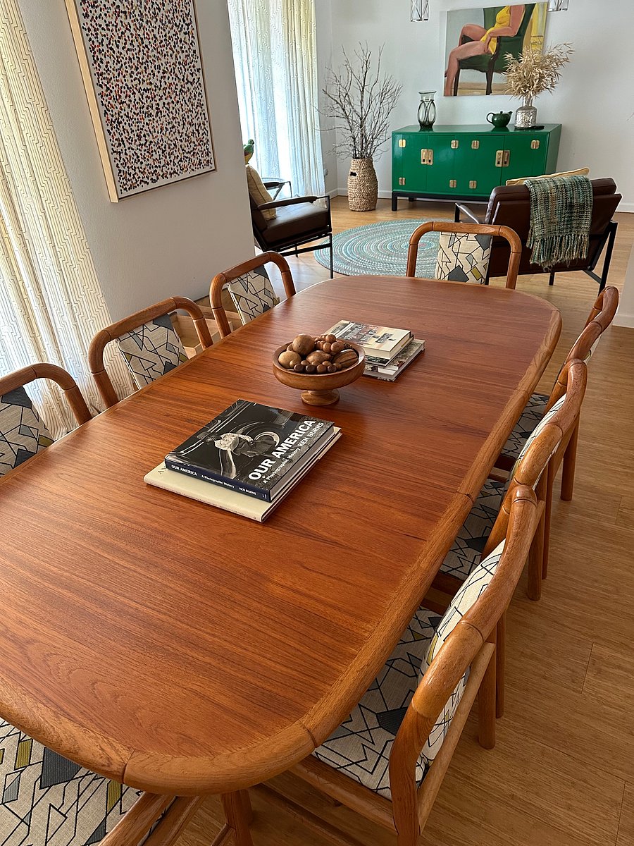 Dining room features refinished mid-century modern and art deco furniture 