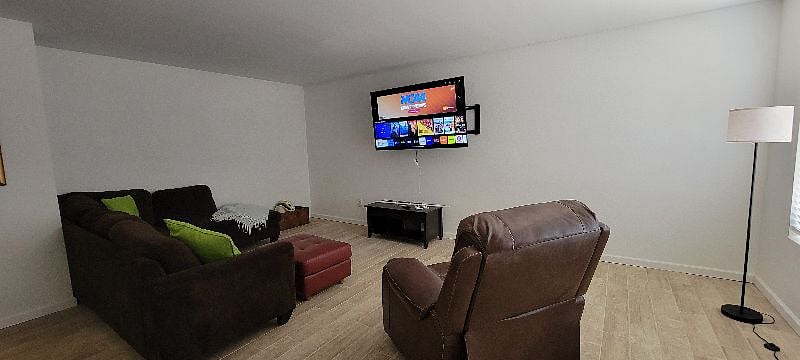 Large Living Room and Smart TV with Streaming Capabilities