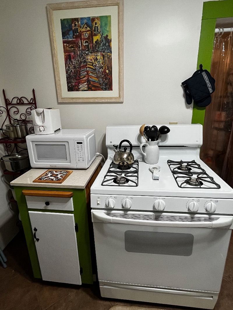 Stove, Microwave, pots, pans, and everything you need cook a healthy meal.