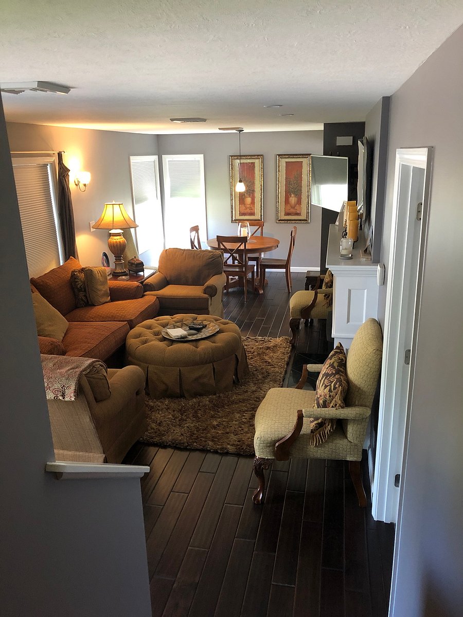 upstairs lounge room and dining area with remote gas fireplace