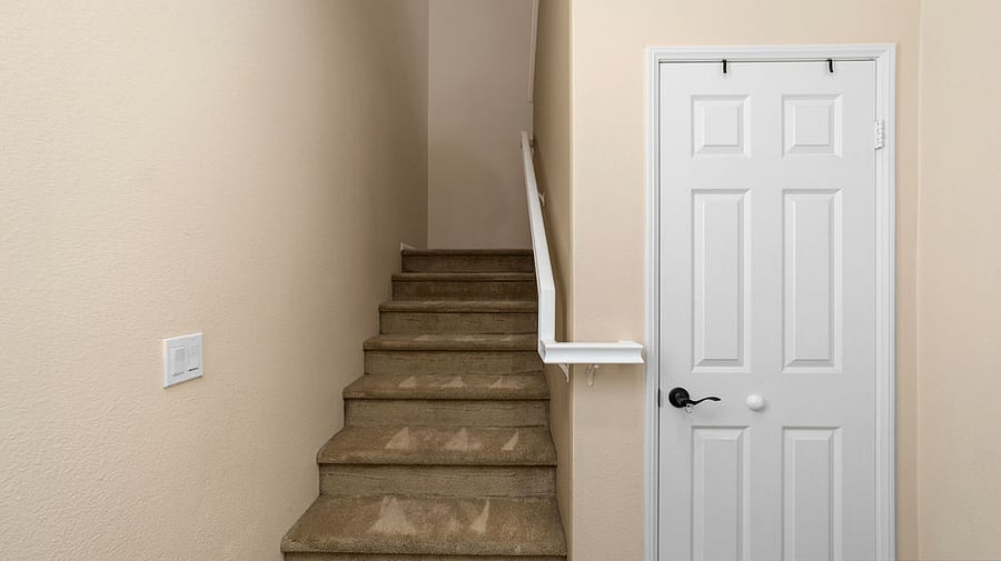 Entry way and owner closet.  Full living space upstairs.