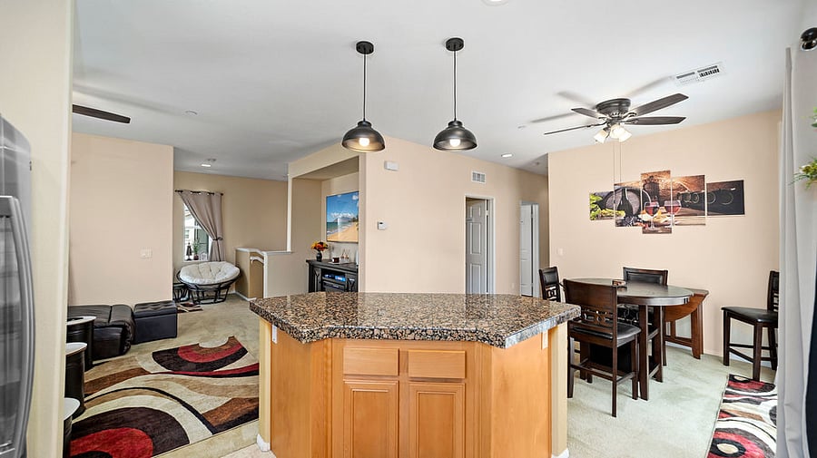 Open floor layout with ceiling fans throughout, and lots of natural lighting.  Most windows have blackout curtains and privacy sheers.