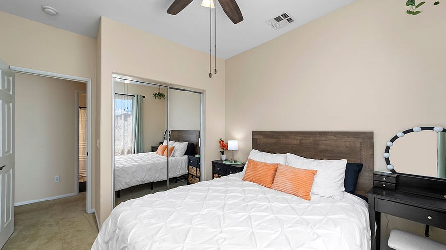 Guest Bedroom with Queen sized adjustable bed (head and foot lift), window, vanity, and mini electric fireplace (heat or flame only)