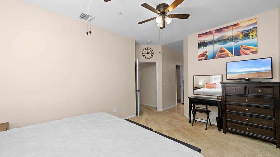 Master bedroom with 32 inch TV with Firestick.