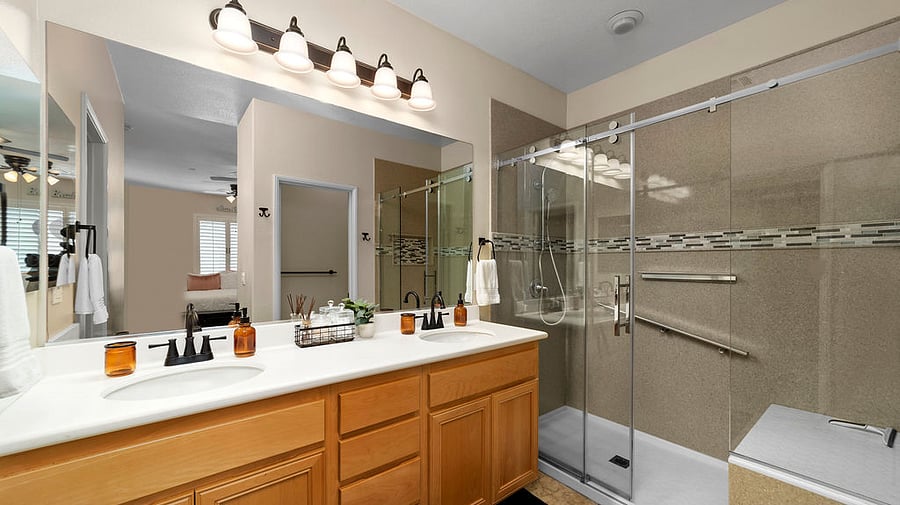 Master Bedroom with standing shower and dual sinks.  Storage drawers with hair dryer included.