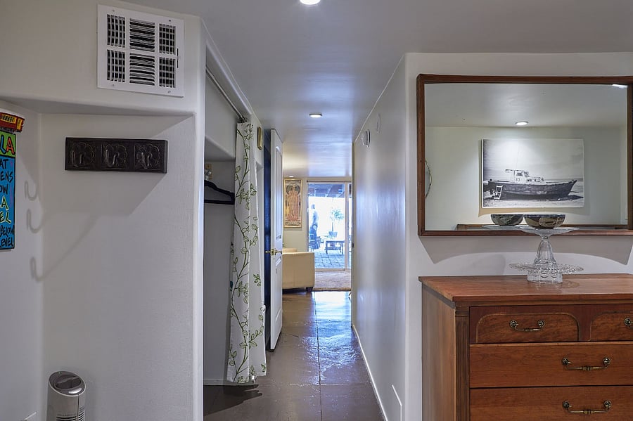 Hall with Large Hanging Closet and Pantry.
View to the Patio