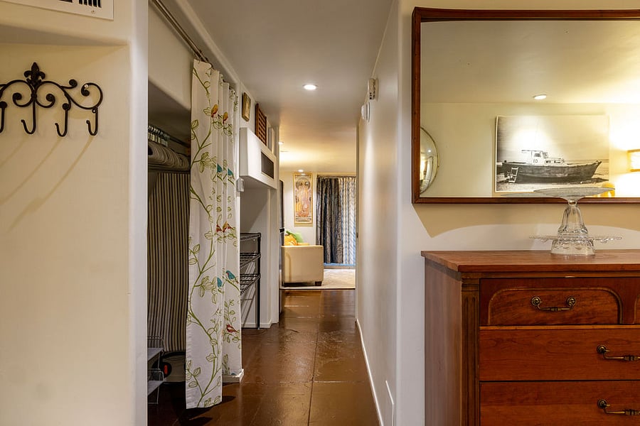 Hall View with Large Hanging Closet and Pantry on the Left