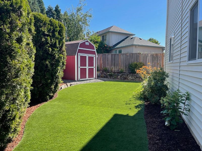 BACKYARD VIEW FROM FRONT GATE - TURF LAWN