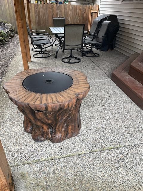 PATIO PROPANE FIRE TABLE FOR COZY NIGHTS