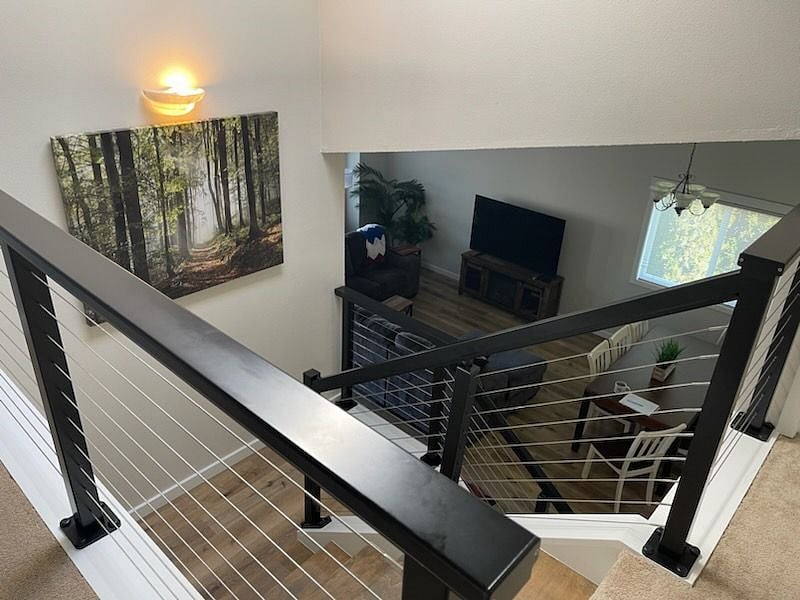 VIEW TO LIVING ROOM FROM UPSTAIRS LANDING