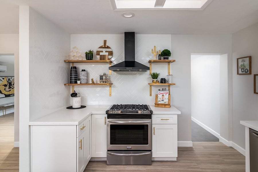 Kitchen - Full-sized Refrigerator, Dish Washer, Microwave, Gas Stove, Toaster, Coffee Maker, Keurig, Cooking Essentials, Silverware, Plates, Bowls, Cups, Bar Kit, and Wine Refrigerator